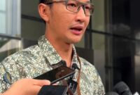 Juru bicara KPK saat di wawancarai Wartawan di Gedung Merah Putih