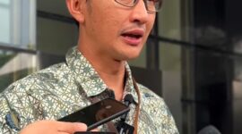 Juru bicara KPK saat di wawancarai Wartawan di Gedung Merah Putih